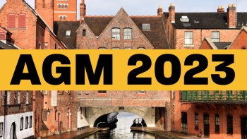 Text saying 'AGM 2023' against a city backdrop