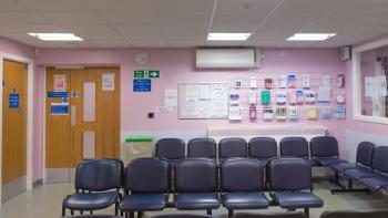 An empty GP clinic waiting room