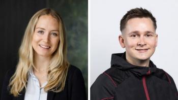 A woman and man smiling