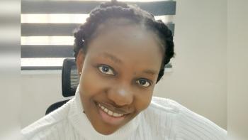 A woman smiling