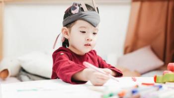 A young girl drawing