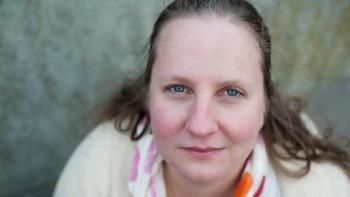 A woman looking at the camera