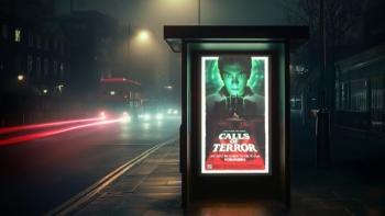 A bus stop advert at night, with traffic running past it