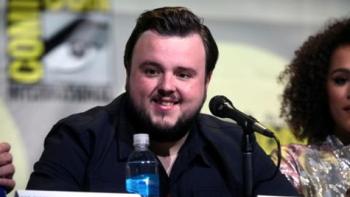 A man speaking at a press conference