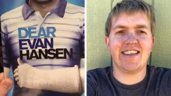 A man smiling, with a brochure showing a man with an arm in a sling, with the words 'Dear Evan Hansen' on top