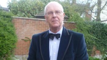 A man wearing a dinner jacket and bow tie