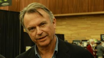 The actor Sam Neill smiling