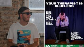 A man wearing sunglasses and a cap, looking to the right, at a poster featuring a man with his head in his hands. Above is the title 'Your Therapist is Clueless'