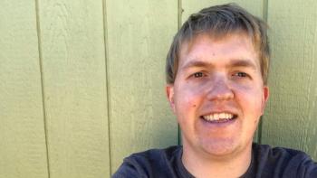 A man smiling for the camera