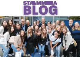 The text 'STAMMA Blog' above a group of people looking at the camera and smiling