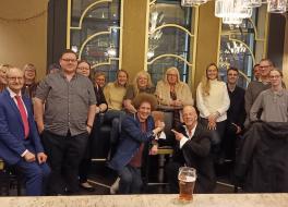 A group of people smiling for the camera