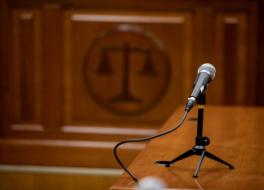 A microphone in a courtroom setting