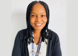 A woman smiling