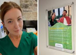 A woman in a medical uniform smiling, next to a poster