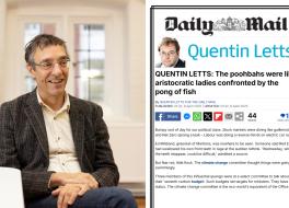 A man sitting down, smiling, next to an insert of a newspaper article