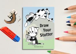 A book cover, surrounded by colouring pencils, a pencil sharpener and an eraser