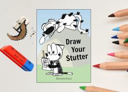 A book cover, surrounded by colouring pencils, a pencil sharpener and an eraser