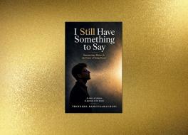 A book cover showing a man breathing gold