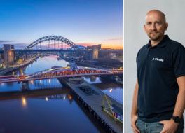 The bridge over the River Tyne at sunset, next to a man smiling