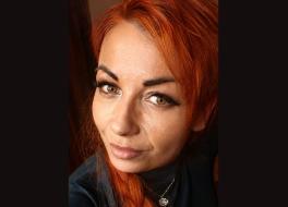 A woman smiling