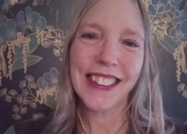 A woman smiling
