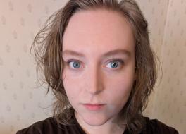 A woman looking at the camera