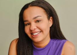 A woman smiling