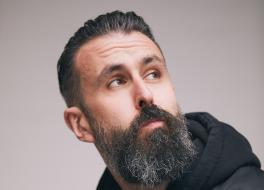 A man looking up and to the right