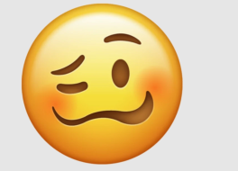 An emoji showing a woozy face