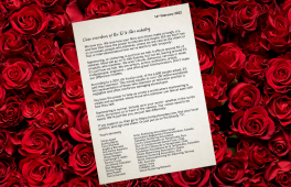 A typed letter with a background of roses