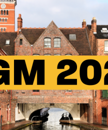 Text saying 'AGM 2023' against a city backdrop