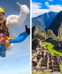 Two people doing a tandem skydive, both giving a thumbs up to the camera, and Macchu Picchu