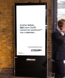 A digital advertisement board in a busy train station