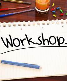 A writing pad with the word 'Workshop' on it