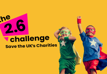 The 2.6 Challenge logo with two children dressed as superheroes