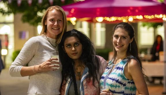 STAMMA staff members Vee, Neha and Catherine outside the conference venue