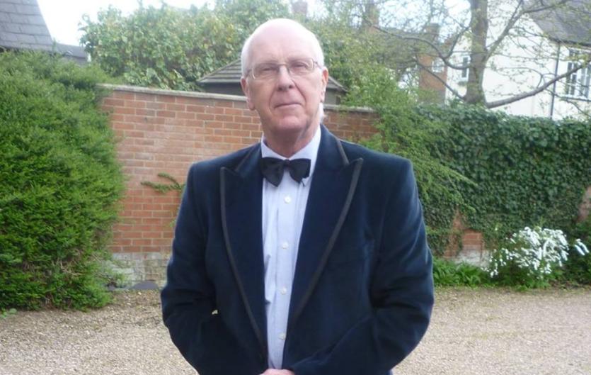What helped me A man in a suit looking at the camera