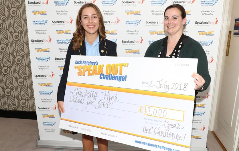 The talk that won a youth speaking contest Erin Stoner with Trudy Kilcullen, head of the Jack Petchey Foundation, holding an oversized prop cheque for £3,000 made out to Westcliff High School, labelled 'Speak Out Challenge'.