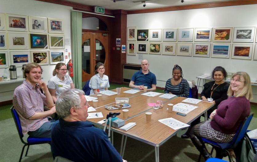 Grimsby & Cleethorpes group Members of the Grimsby group sitting round a table looking at the camera
