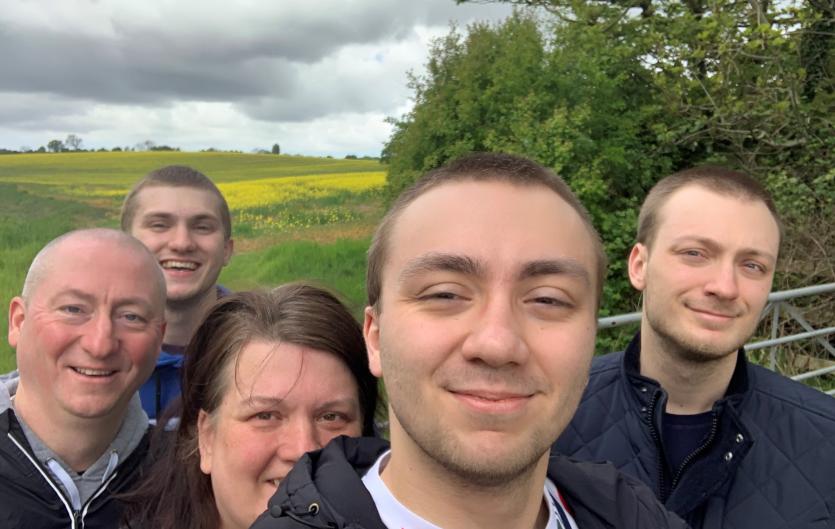Living with a stammer in lockdown The article's author, Jack Dinsley, with his family