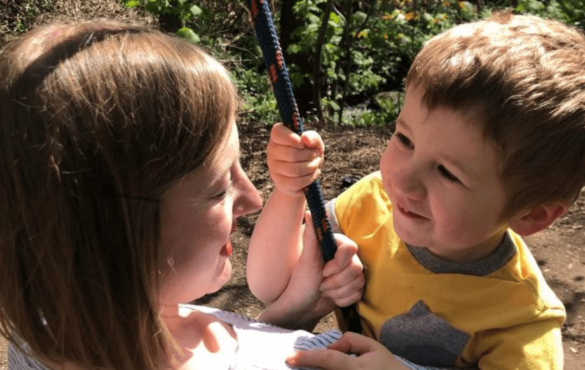Supporting myself as the parent of a child who stammers A mother holding her toddler son