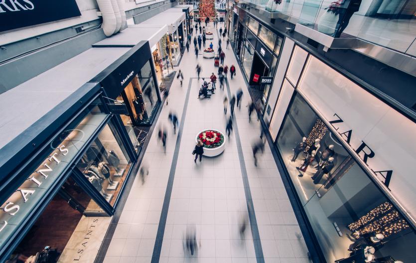Job talk Indoor shopping precinct seen from above, moving people are blurred