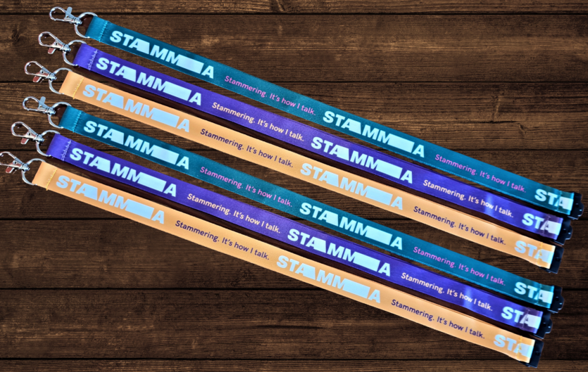 Six lanyards with the STAMMA logo on them