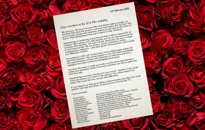 A typed letter against a backdrop of roses