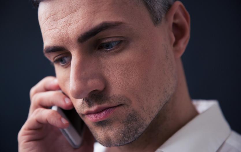 Outreach service during isolation A man talking on the telephone