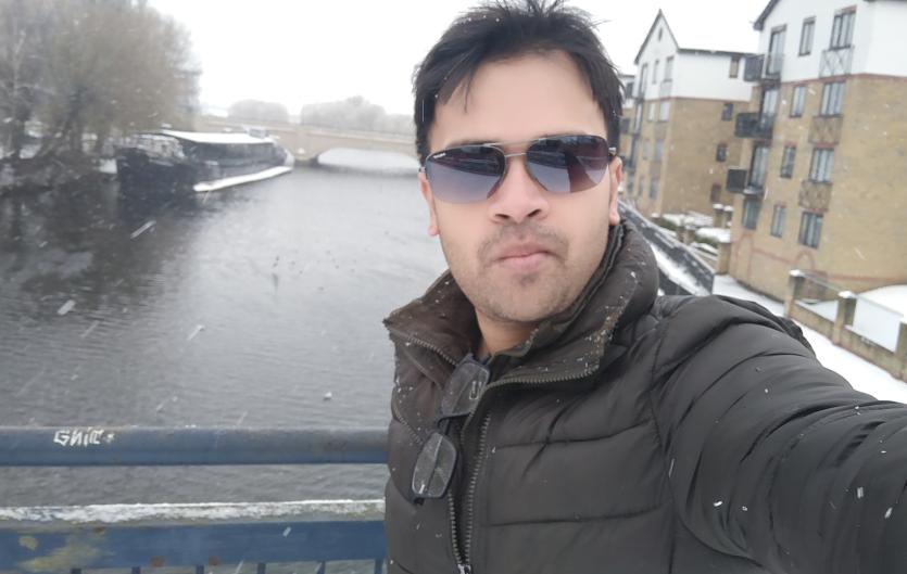 I have now started being friends with my stammer Rahul Bhoyer: selfie in snow by a canal