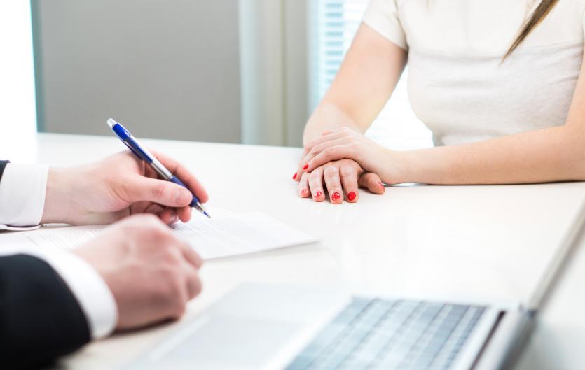 Resources for Recruitment Agencies Cropped view of an employer checking a CV at a job interview