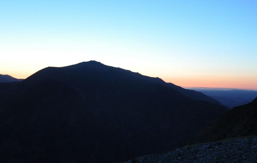 A mountain range at dusk