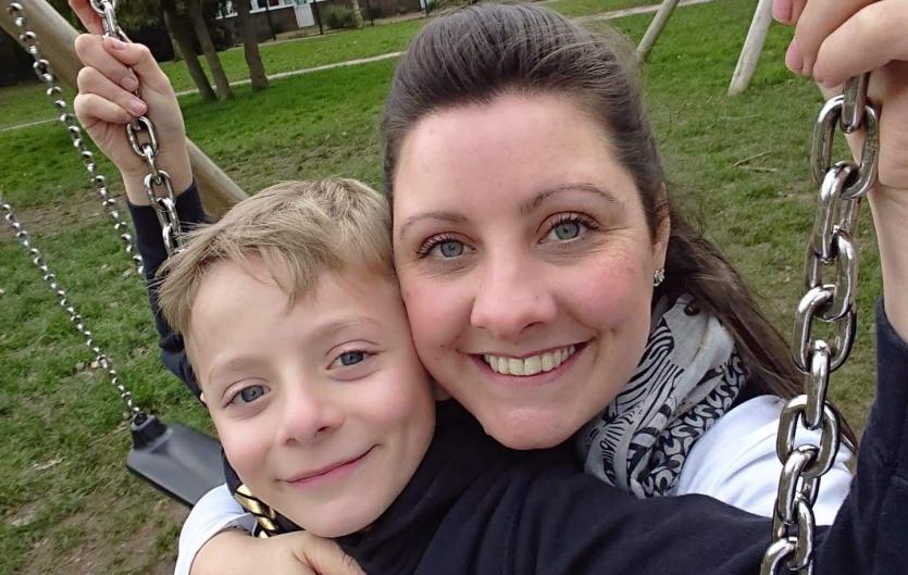 For Parents A woman with her son on a swing