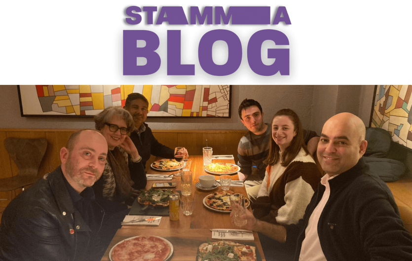Blog: Starting a support group is not scary The words STAMMA Blog, with a picture underneath of a group of people sitting at a table in a restaurant, looking at the camera and smiling